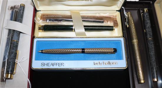 Two Sheaffer Targa grey marble fountain pens, a similar green Jaguar pen, a Lady Ballpoint and an Imperial Sovereign pen